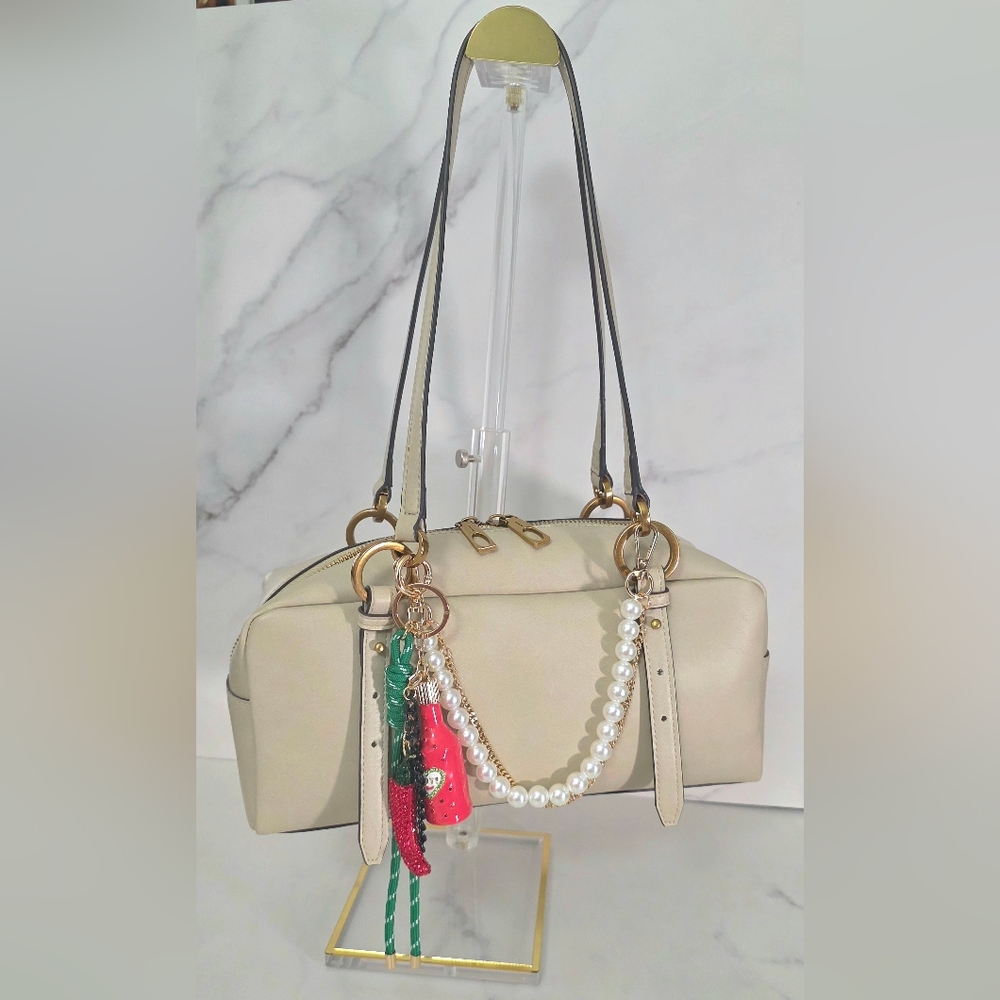Brand new Cream Vegan Leather satchel with Gold Pearl-Accent charm